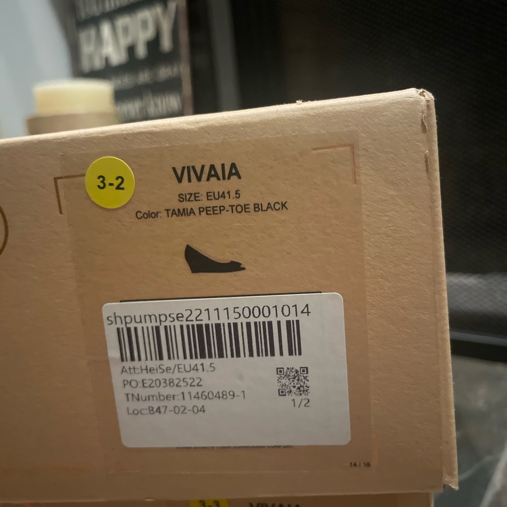 Vivaia open toed with 2 in. wedge heel.